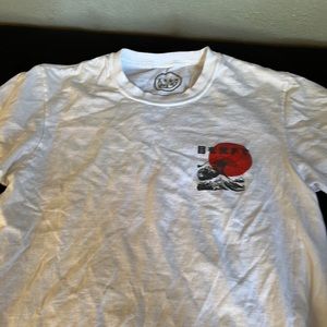 White tee shirt with print designs